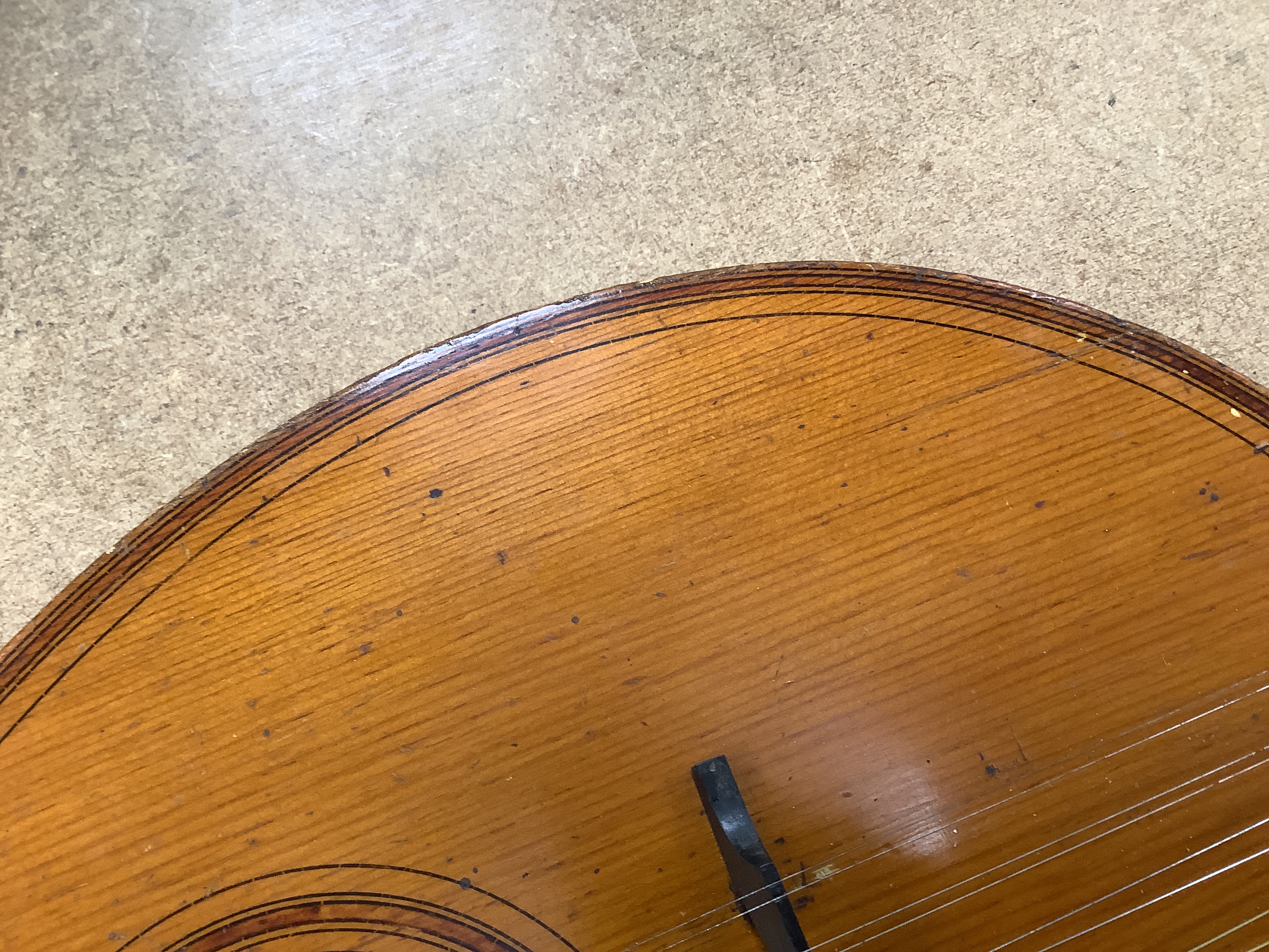 An 18th century English guitar, c.1760-80, possibly of London manufacture by Preston or Hintz, with ten watch key tuned strings, with maple back and neck, spruce soundboard, three original square section holes intended f